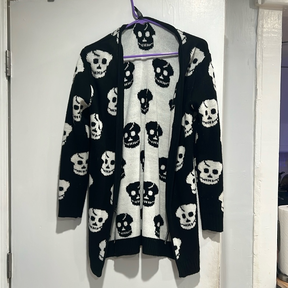 Bloomingdale’s brand Aqua Skulls sweater- oversized and fits bigger